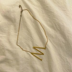 Gold Anthropologie M necklace